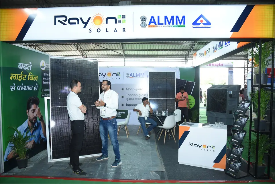 Busy exhibition aisle with visitors at Maha Expo